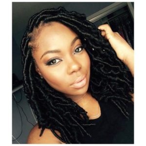 shiny black faux locs with side part
