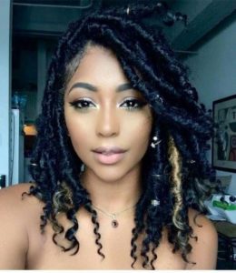 shoulder length goddess locs with hair jewelry