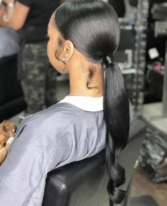 Sleek Low Ponytail With Styled Sideburns