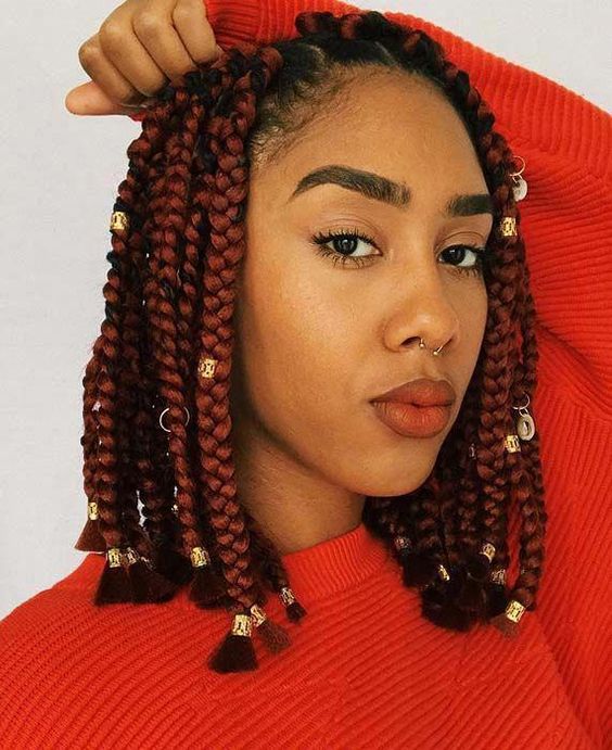 Short Red Box Braids With Gold Jewelry