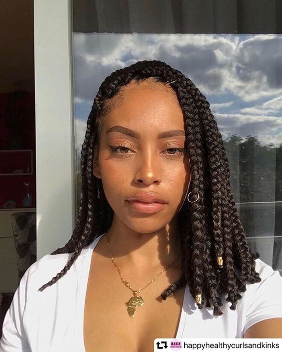 Shoulder Length Box Braids With Rings and Gold Beads