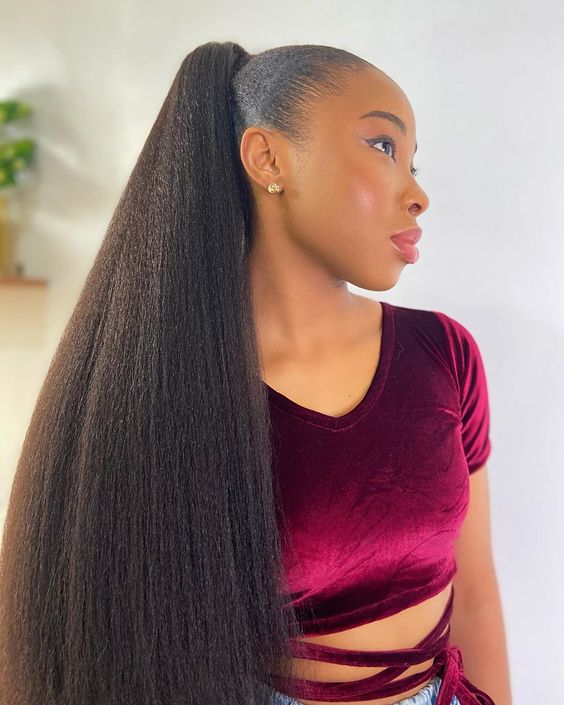 super long and thick ponytail extension on afro blowout