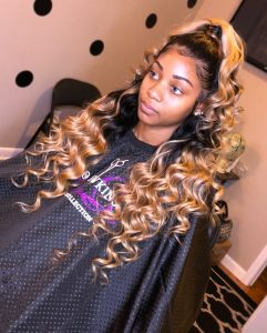 black to blonde ombre half up half down sew in with curls