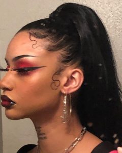 high ponytail with swooping edges
