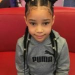 Cornrows With Gold Beads And Double Buns