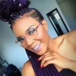 half up half down purple braids shaved side