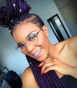 half up half down purple braids shaved side