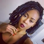 navy blue faux locs with gold beads