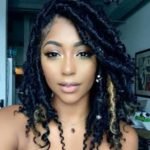 shoulder length goddess locs with hair jewelry