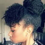 high bun with curly bangs