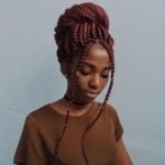 High Bun With Tendrils