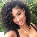 curly sew in bob with side part