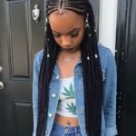Hip-Length Tribal Braids With Silver Jewelry