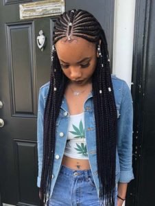 Hip-Length Tribal Braids With Silver Jewelry
