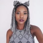 short grey box braids double buns