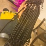 small box braids with curly ends