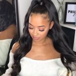 Sleek High Ponytail With Loose Waves