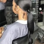 Sleek Low Ponytail With Styled Sideburns