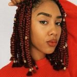 Short Red Box Braids With Gold Jewelry