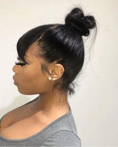 bangs and high bun partial sew in