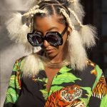 patterned-braids-with-fluffy-tails-on-blowout-hair