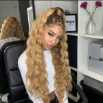 curly blonde half up half down sew in with feed in braids