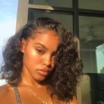 curly bob with baby hair