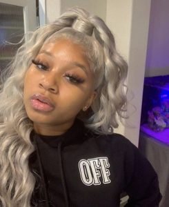 grey half up half down sew in with curls