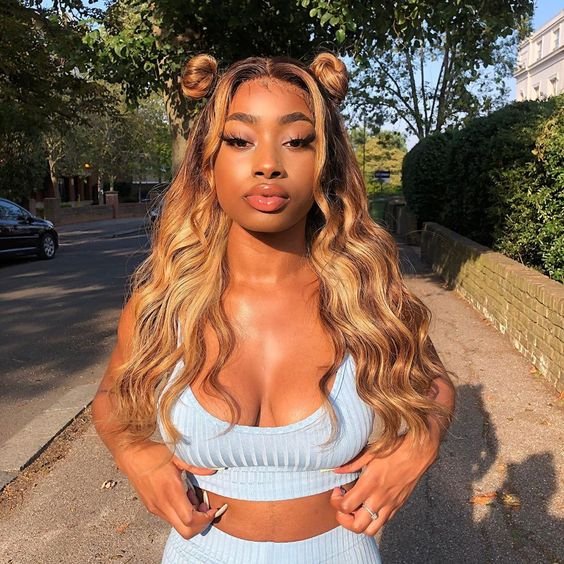 curly blond half up down sew in with feed in braids