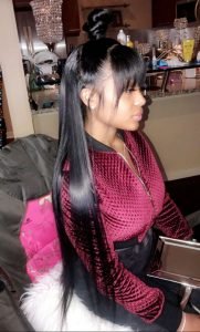 long half up half down sew in with straight bangs