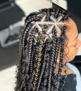 pencil-sized triangle box braids with gold string