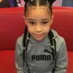 Cornrows With Gold Beads And Double Buns