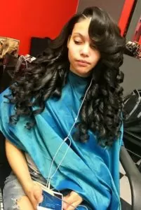 long bouncy curls sew in