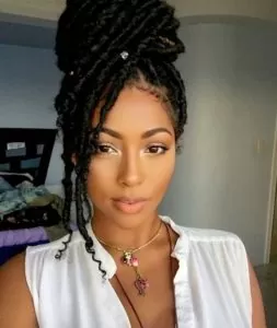 high bun swoop bang goddess locs