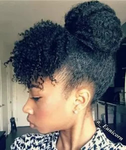 high bun with curly bangs