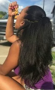 Dominican blowout half up style