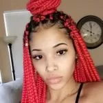 Bright Red Box Braids With Half Up High Bun