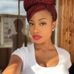 Red Box Braids High Bun With Swoop Bangs