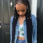 Hip-Length Tribal Braids With Silver Jewelry