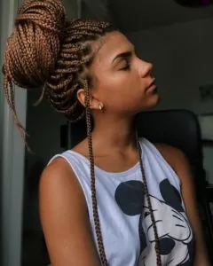 light brown box braids high bun