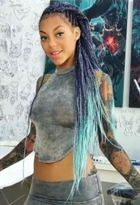 small purple green box braids