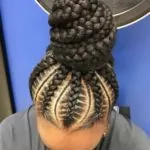 Chunky High Bun With Multisized Stitch Braids