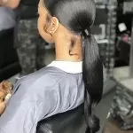 Sleek Low Ponytail With Styled Sideburns