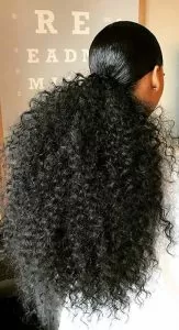 Voluminous Curly Low Ponytail