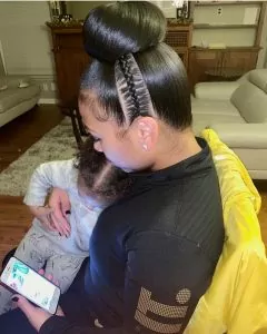 Side braid sleek bun