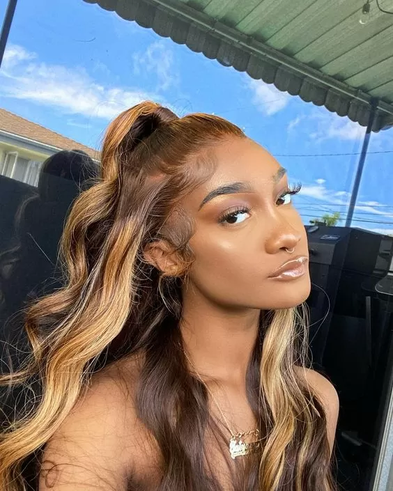 curly blond half up down sew in with feed in braids