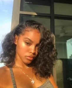curly bob with baby hair