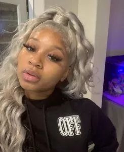 grey half up half down sew in with curls