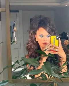 half up half down wirh side bang and loose wave