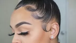 high bun with baby hairs